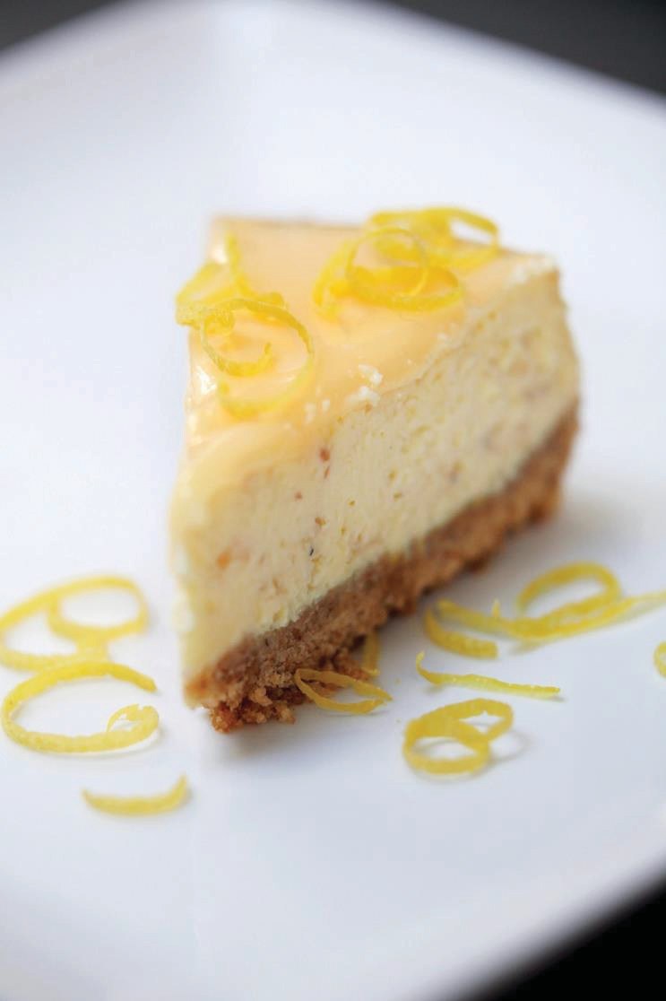 White chocolate cheesecake with Lemon Curd and roasted hazelnuts